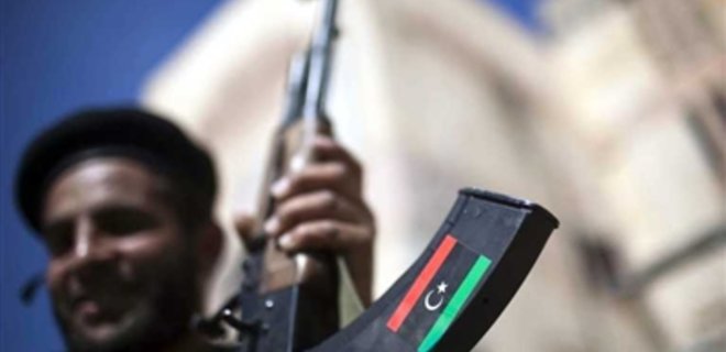 Лидер Ливии считает, что страна не стала свободной - Фото