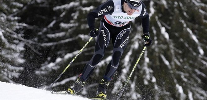 Сочи-2014: швейцарец выигрывает золотую медаль в лыжных гонках - Фото