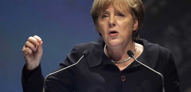 Меркель обвинила Путина в интервенции, он согласился на диалог - Фото