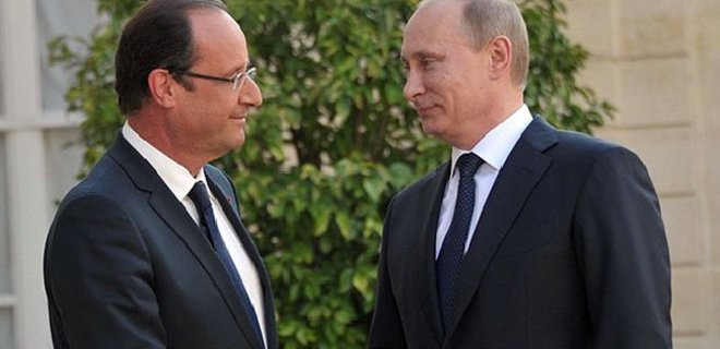Президенты Франции и России провели длительные переговоры - Фото