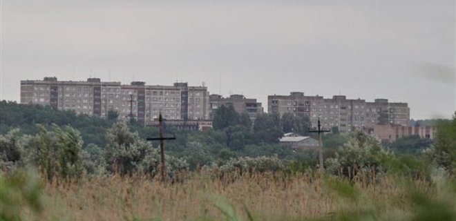 Заложники в Славянске: Боевики бросили оружие и деньги - Фото