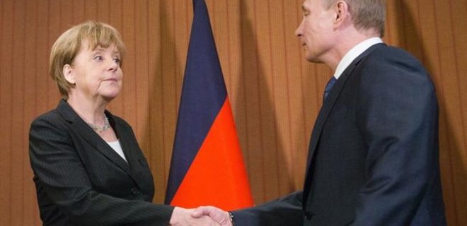 Ответственность за события в Украине несет Россия - Меркель - Фото