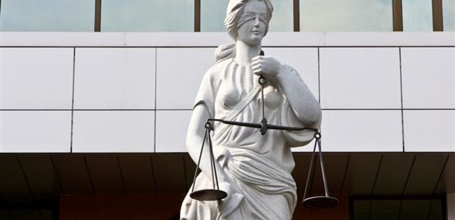 Гаагский суд обязал Россию выплатить $50 млрд владельцам ЮКОСа - Фото