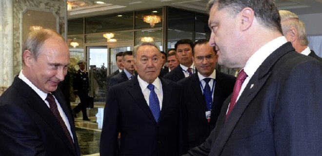 Порошенко и Путин обсудили режим прекращения огня в Донбассе - Фото