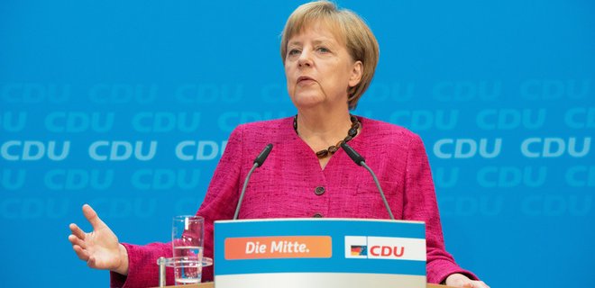 Меркель: Санкции - единственное средство нажима на Россию  - Фото