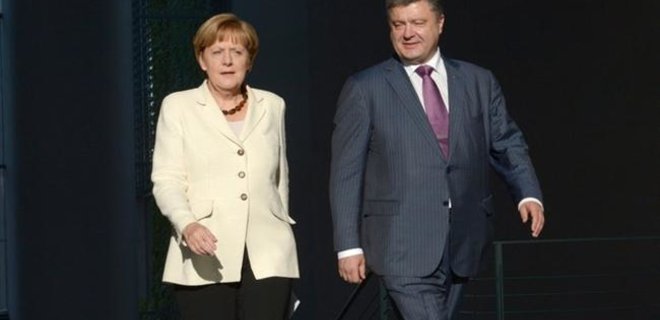 Меркель требует полного отвода войск РФ из Украины - Фото