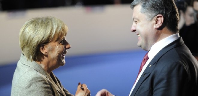 Порошенко обсудил с Меркель предстоящую встречу в Милане - Фото