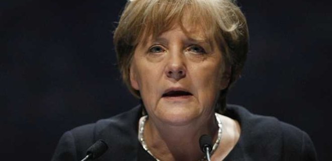 Меркель привела для Украины пример падения Берлинской стены - Фото