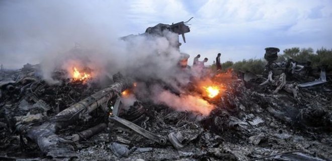 В Донецкой области эксперты продолжили сбор обломков Boeing 777 - Фото