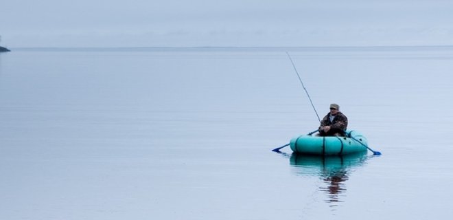 На Киевском море спасатели ищут пропавших рыбаков - Фото