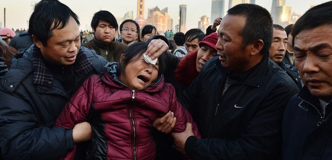 В Китае предотвращено массовое самоубийство обманутых вкладчиков - Фото