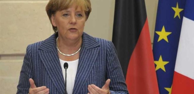 Меркель: Учитывая реалии, санкции против РФ останутся в силе - Фото