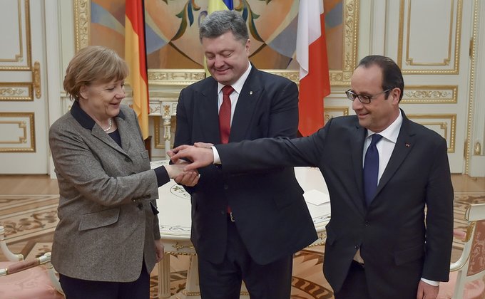 В поисках мира: фото с переговоров Порошенко, Меркель и Олланда