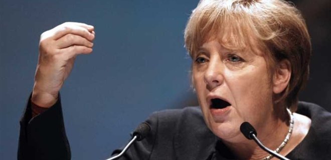 Меркель в Японии призвала поддержать санкции в отношении РФ - Фото