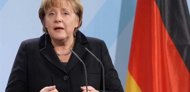 Минские соглашения выполняются крайне сложно - Меркель - Фото