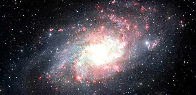 Ученые обнаружили галактику, которая в 300 трлн раз ярче Солнца - Фото