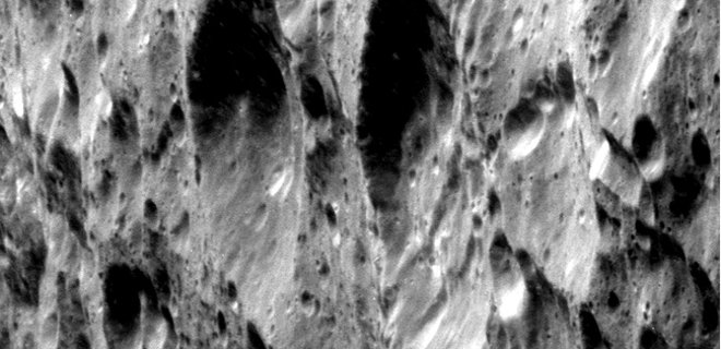 В НАСА показали фотографию спутника Сатурна Реи - Фото