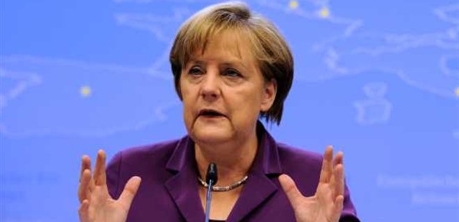 Меркель: Ослабление санкций зависит от РФ и Украины - Фото