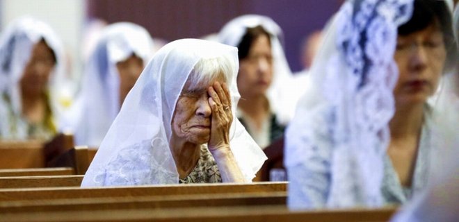 В Японии вспоминают жертв ядерного удара по Нагасаки - Фото