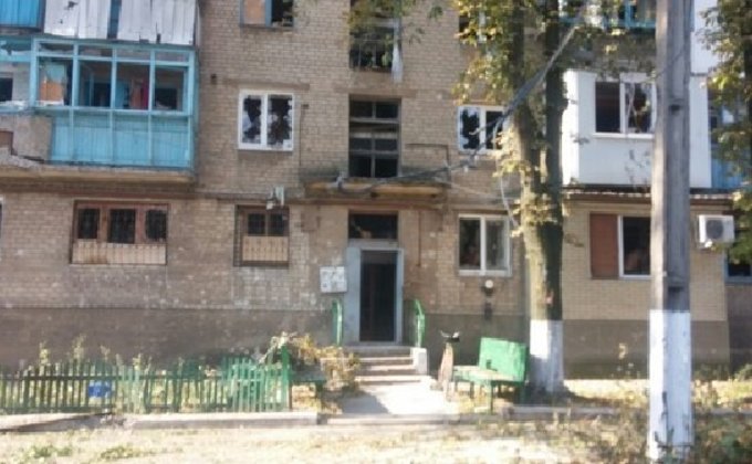 Последствия обстрела боевиками прифронтовой Красногоровки: фото