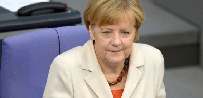 Меркель исключает списание долгов Греции - Фото
