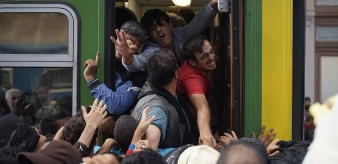 Обнародован план Юнкера по распределению тысяч мигрантов - СМИ - Фото