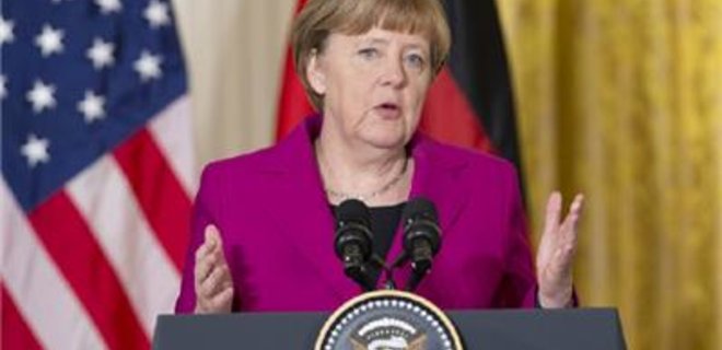 Меркель: Кроме минских, теперь есть и парижские гарантии - Фото