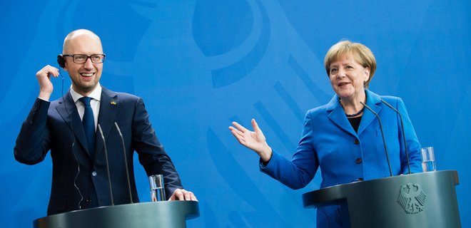 Меркель призвала Яценюка побороть коррупцию в Украине - Фото