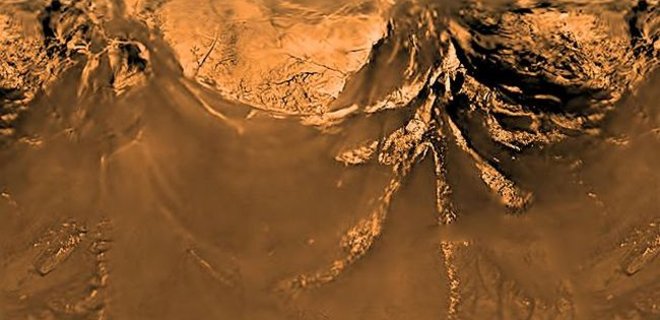 NASA показало новое фото сатурнианского спутника Титана - Фото