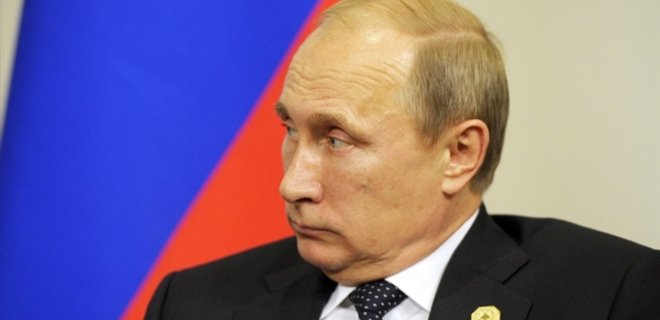Путин: не верю, что Порошенко не управляет Roshen - Фото
