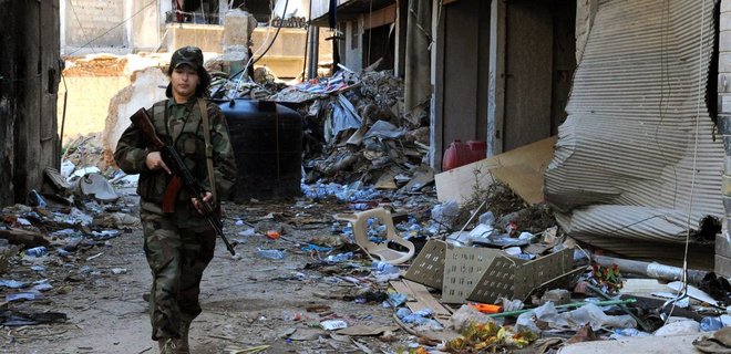 Войска Асада обстреляли город Дарайа после доставки гумконвоя - Фото