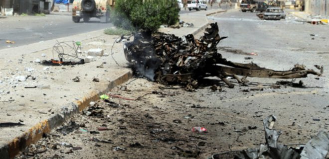 Более 70 человек погибли при взрыве бомбы на АЗС в Ираке - Фото