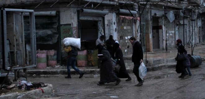 В Алеппо началась операция по эвакуации повстанцев - Фото