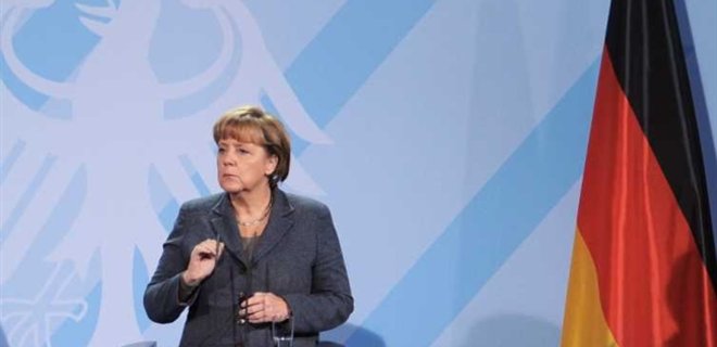 Меркель призвала ускорить отправку беженцев после атаки в Берлине - Фото
