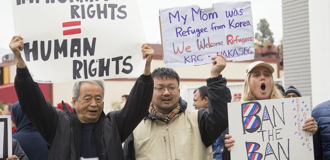 В США прокатилась волна протестов против депортации имигрантов - Фото
