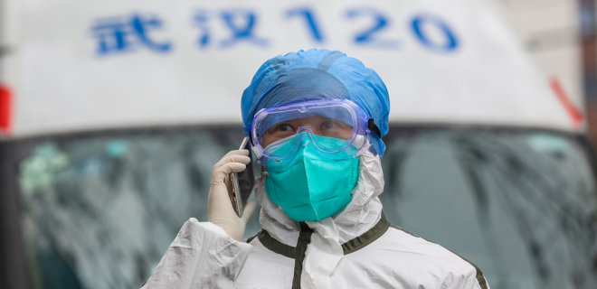 Вспышка коронавируса. В Китае погибли 304 человека - Фото