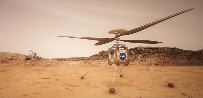 Марсианский вертолет в полете снял ровер Perseverance: разглядеть его непросто – фото  - Фото