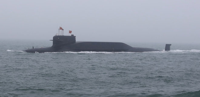 Редкое фото. Спутник случайно зафиксировал вход атомной субмарины на подземную базу Китая - Фото