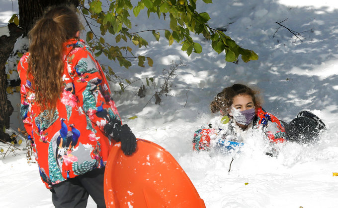 Снеговики в масках и снежный король Манхэттена: красота зимнего Нью-Йорка – фоторепортаж