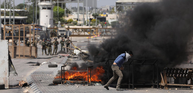 Столкновения между израильскими военными и палестинцами на Западном берегу: 11 погибших - Фото