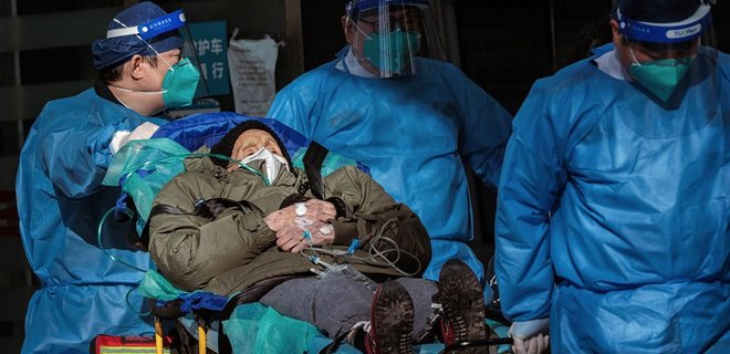 У Китаї на тлі сплеску епідемії перестали публікувати офіційну статистику COVID-19 - Фото